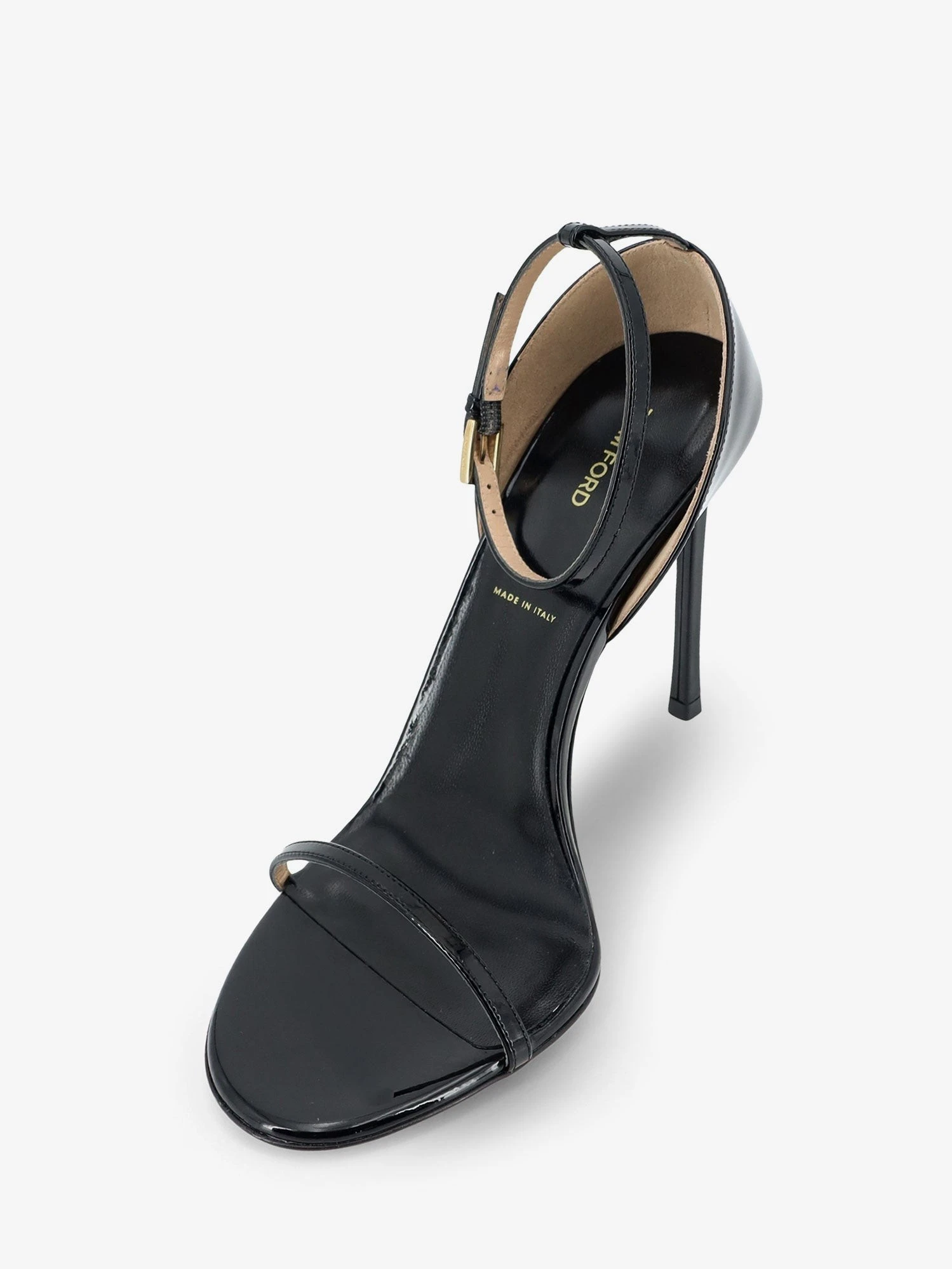 Patent leather sandals.webp