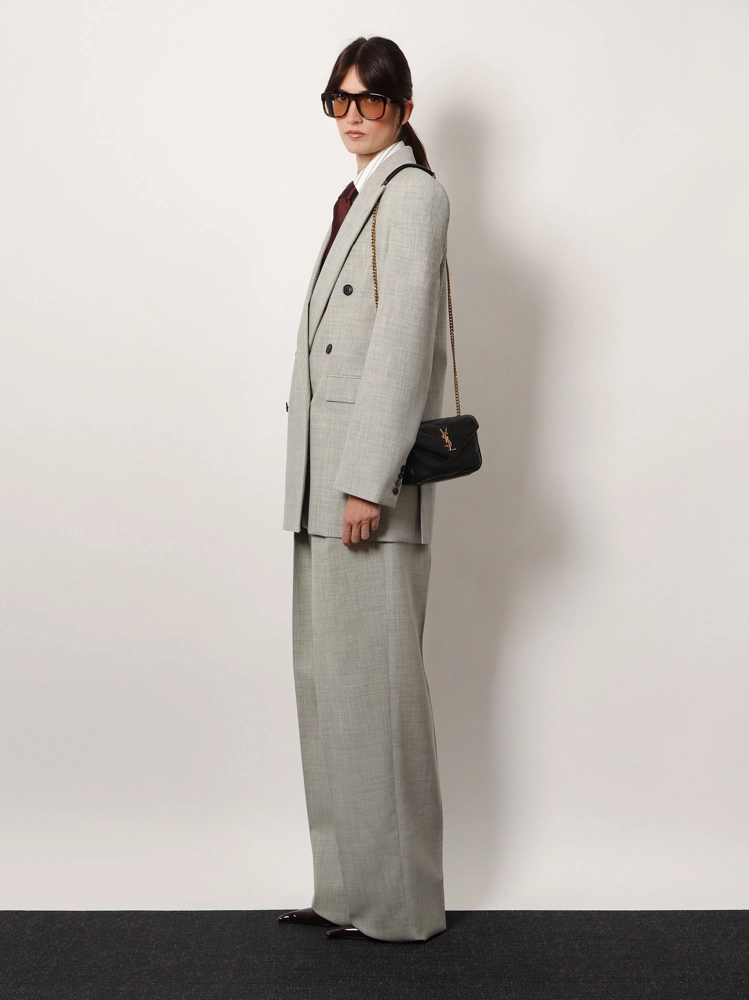 Loulou Mini leather crosbody bag with chevron stitching.webp
