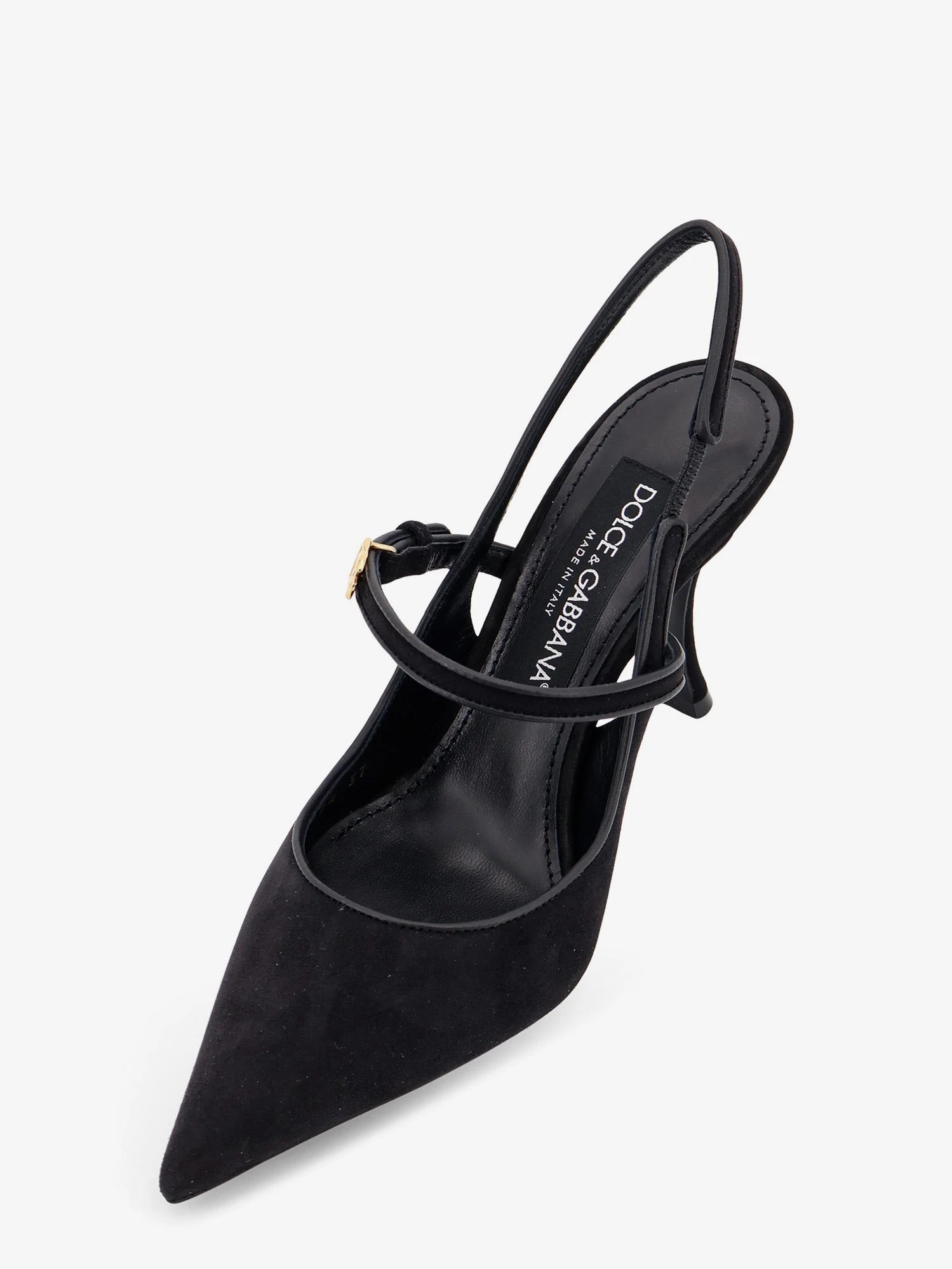 Leather and suede pumps.webp
