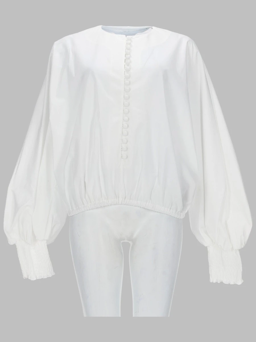 CAMICIA CON MANICA A PIPISTRELLO.webp