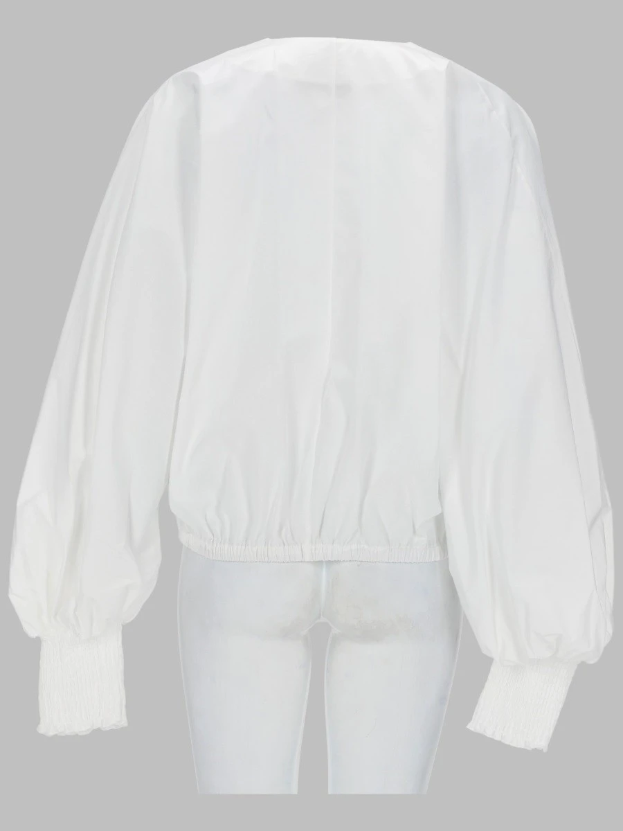 CAMICIA CON MANICA A PIPISTRELLO.webp