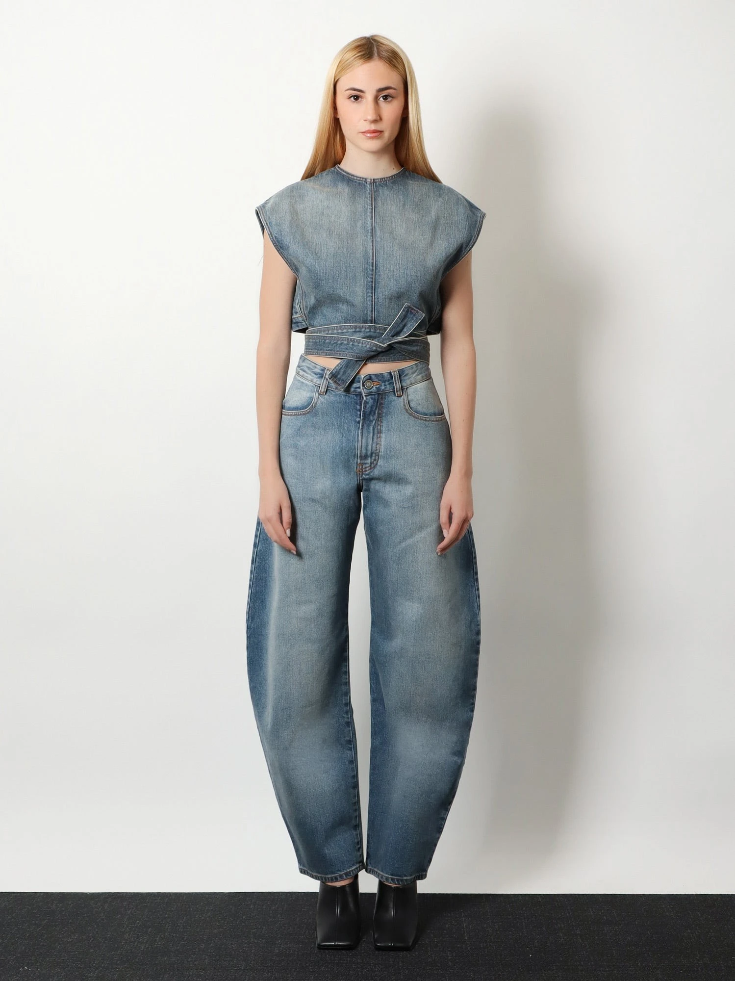 Faded blue denim jeans.webp