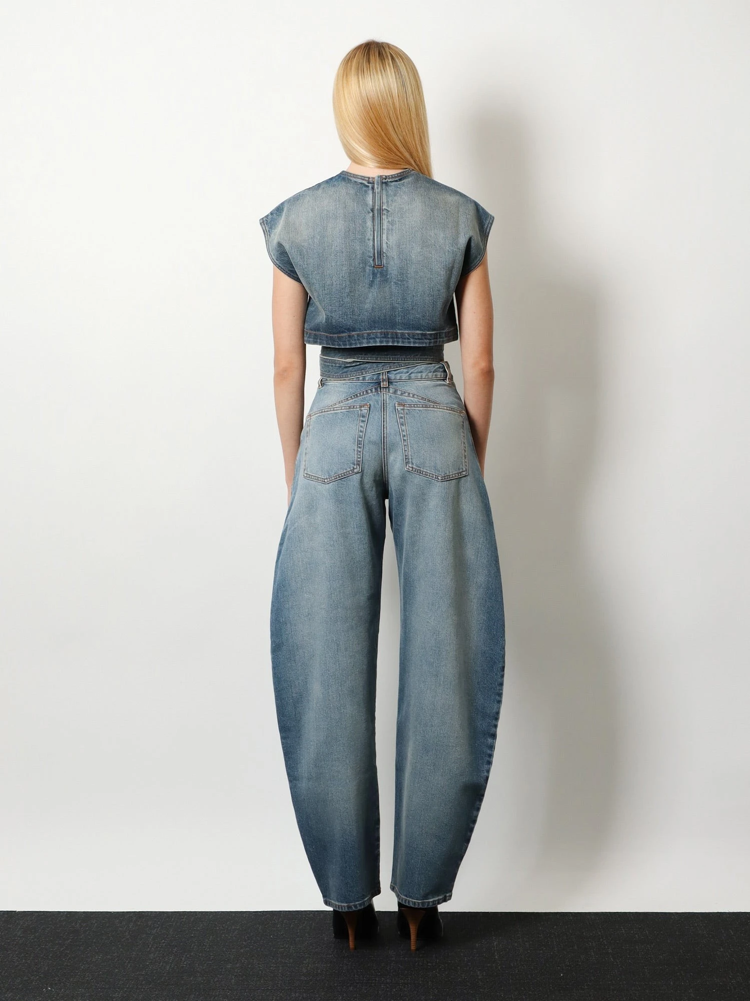 Faded blue denim jeans.webp
