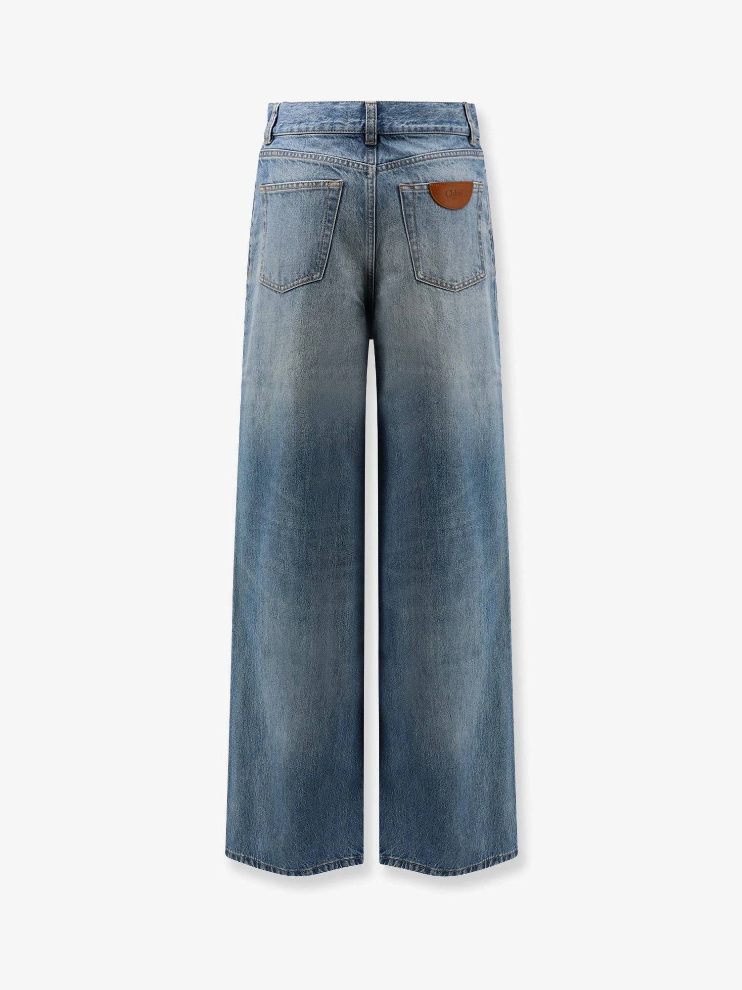 Blue denim jeans with logo label on the back.webp