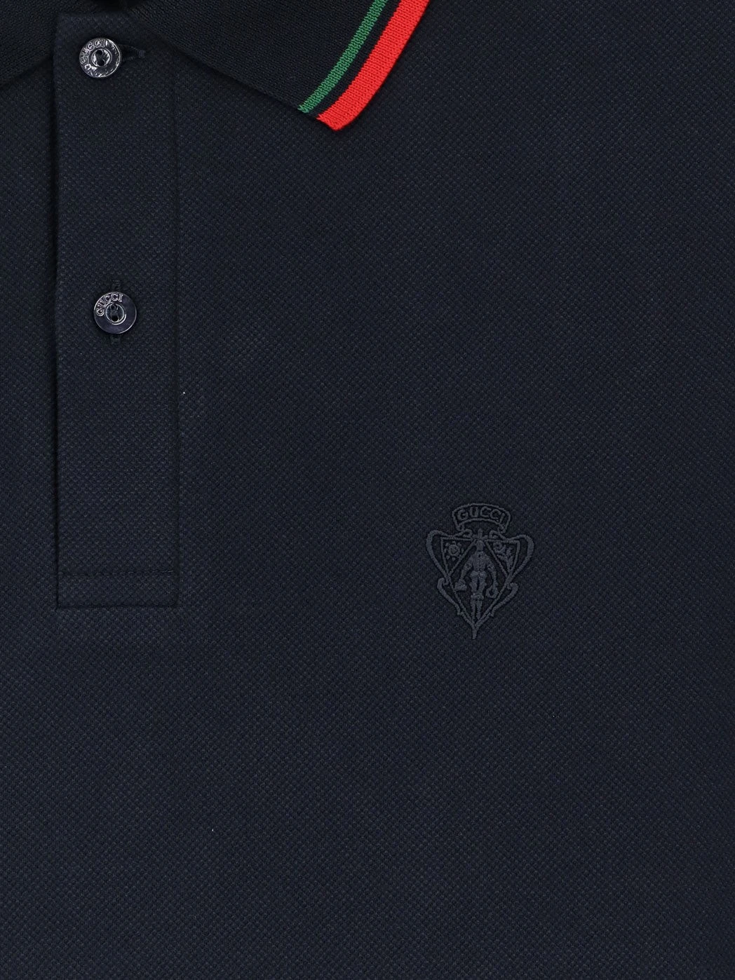 Cotton polo shirt with embroidered logo on the front.webp