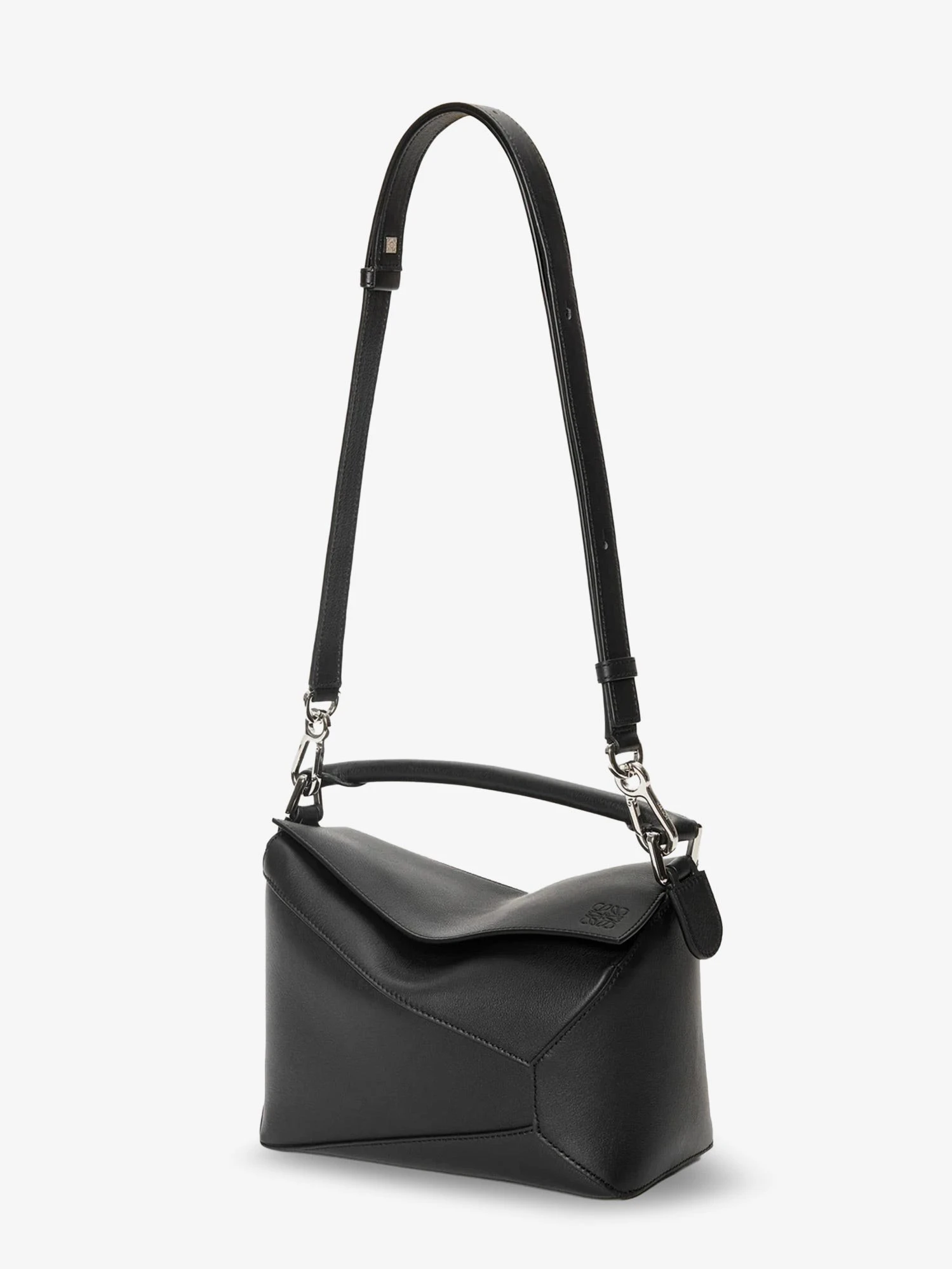 Puzzle Edge leather handbag with engraved Anagram logo.webp