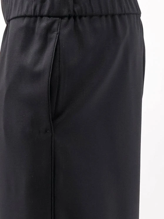 Wool trousers with Logo detail.webp